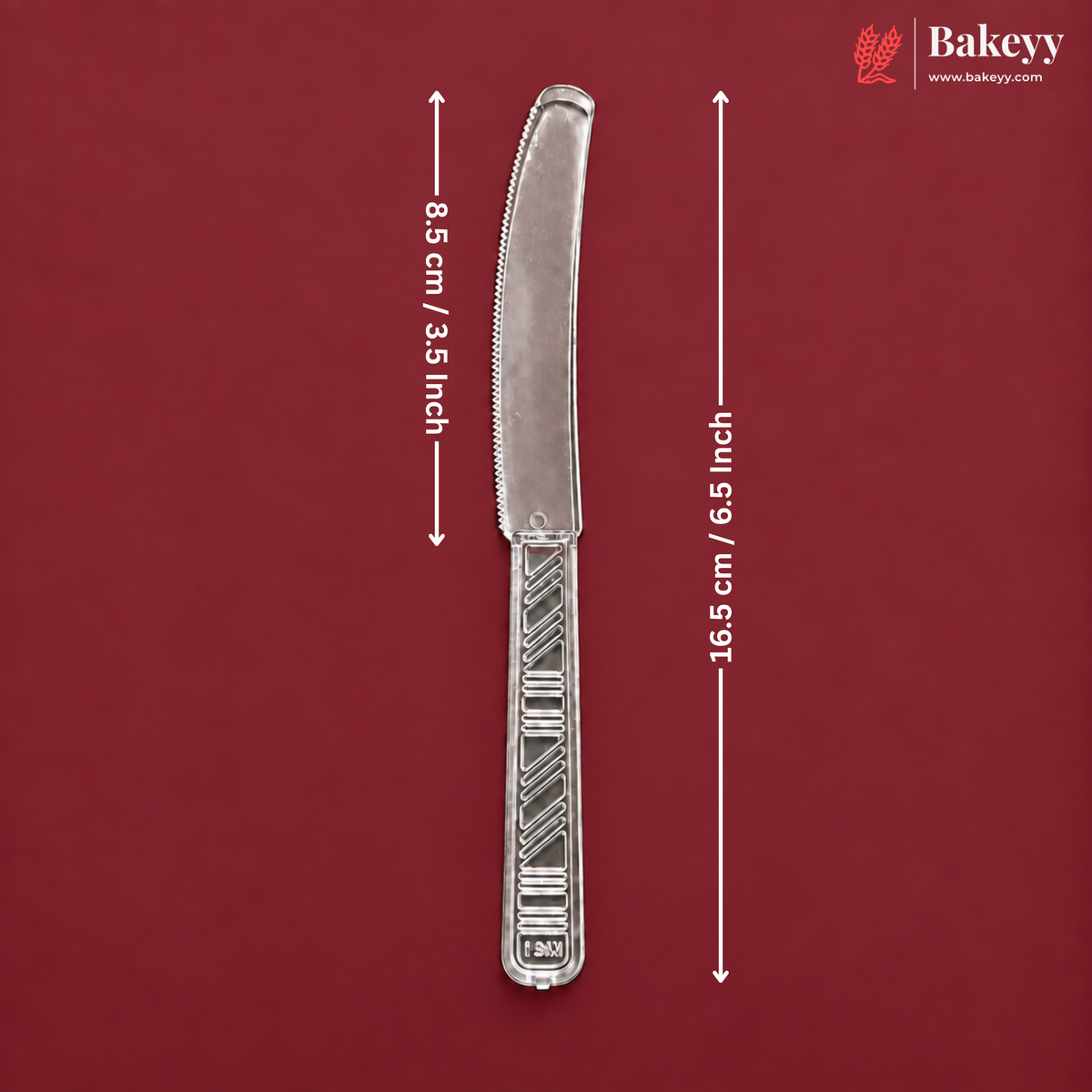 A single metal cake or pastry server shown vertically on a dark red background, with white dimension arrows and text indicating a height of 16.5 cm / 6.