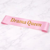 DramaQueenSatinPartySashPink_WhitewithGoldFoilLettering_1 - Bakeyy.com