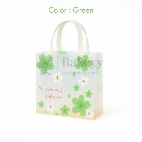 Small green floral gift bag with decorative elements on a white background