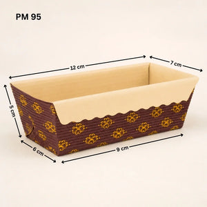 A rectangular woven basket or tray with a dark brown exterior patterned with yellow floral motifs and a beige interior, shown with black dimension arrows and labels indicating measurements of 12 cm, 7 cm, 5 cm, 6 cm, 9 cm, and 9 cm on a plain light beige background.