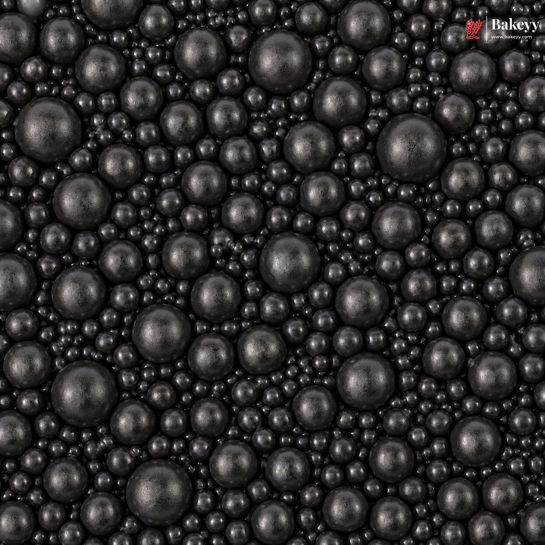 Close-up of black pearls with 'Bakeyes' branding in the corner.