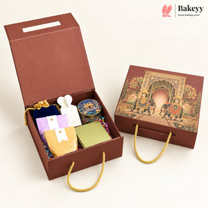 A brown gift box set from Bakeyy, featuring an open box filled with assorted sweets and a matching illustrated closed box on a clean white background.