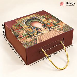 A rectangular brown gift box with a colorful traditional illustration on the lid, shown with measurement arrows and labels indicating dimensions of 20 cm by 25.5 cm by 10 cm, plus a gold rope handle.