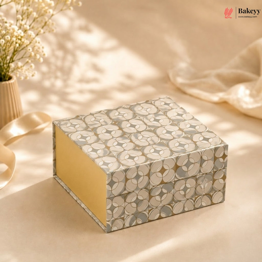 Decorative box with floral pattern on a soft background, featuring the brand 'Bakeyy'.