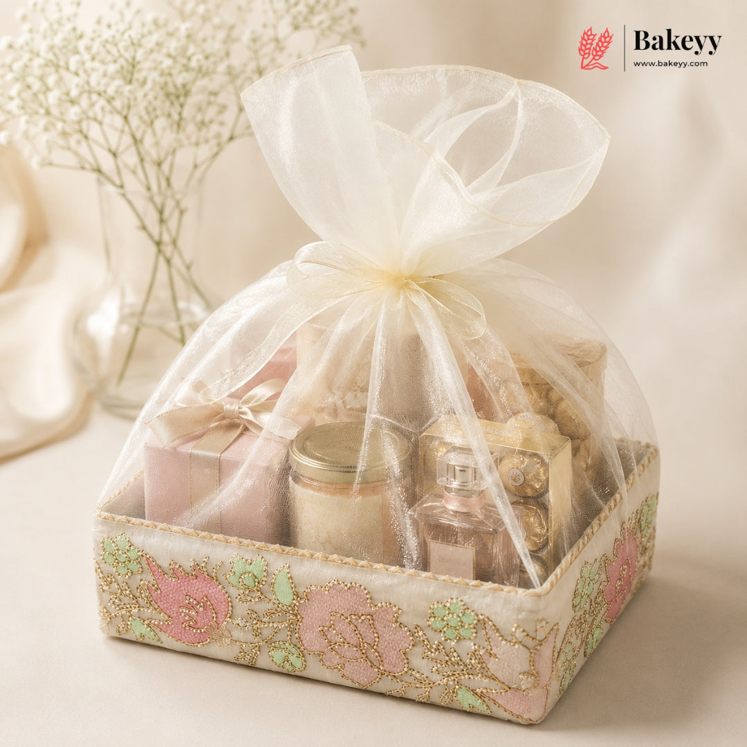 Gift set in a decorative box with sheer cover, featuring products from Bakeyy brand.