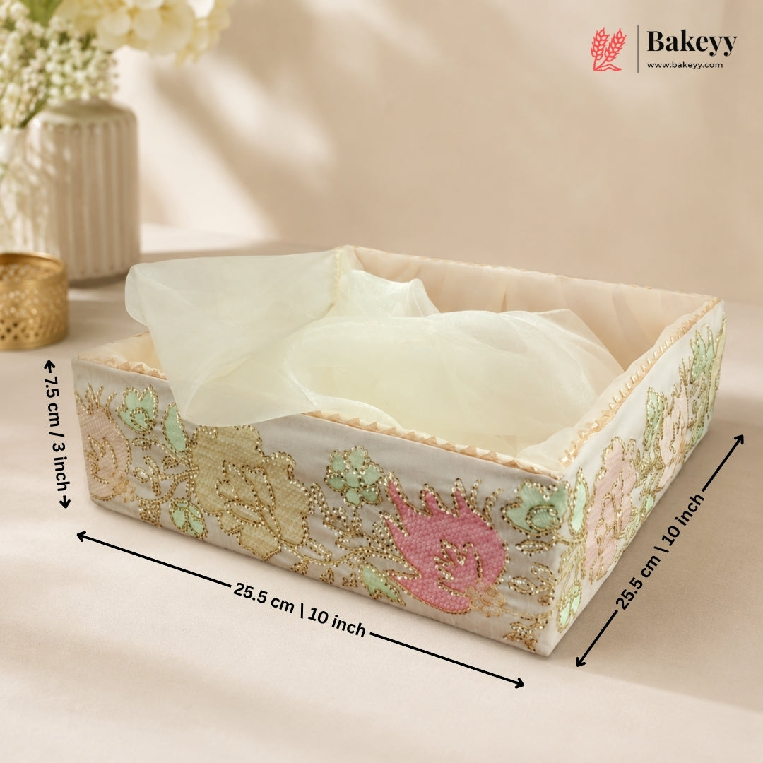 Decorative tissue box with floral design and dimensions labeled, featuring the Bakeyy brand.
