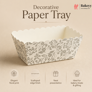 Decorative paper tray with floral pattern on a beige background, featuring the Bakeyy brand.