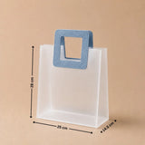 White paper bag with a blue handle and measurements on a beige background