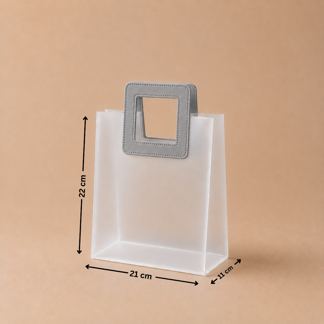 White paper bag with a gray handle and measurements on a beige background