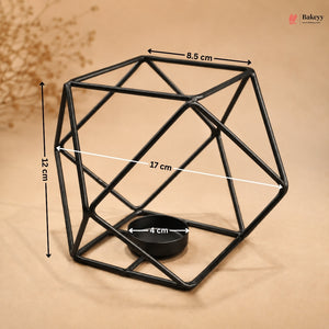 Black geometric candle holder with measurements on a beige background