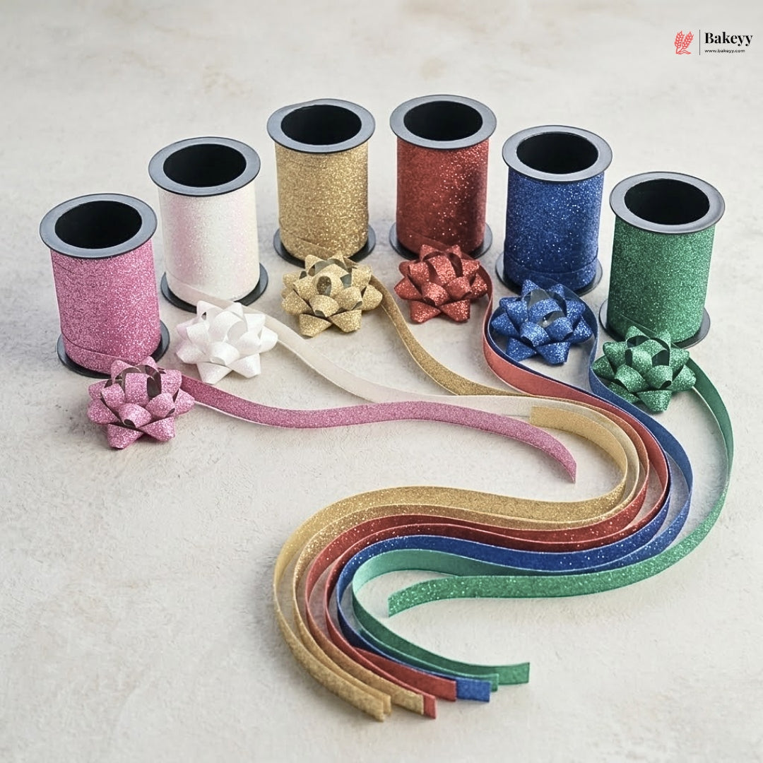 Colorful ribbon spools with decorative bows on a light background