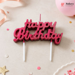 Red 'Happy Birthday' candle topper on a light background with decorative elements.