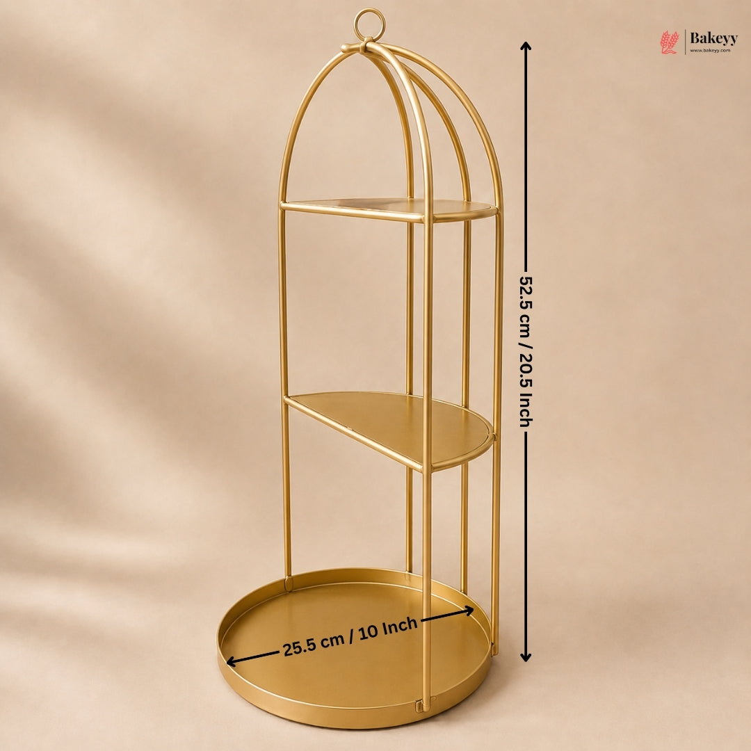 Gold three-tiered shelf with dimensions on a beige background