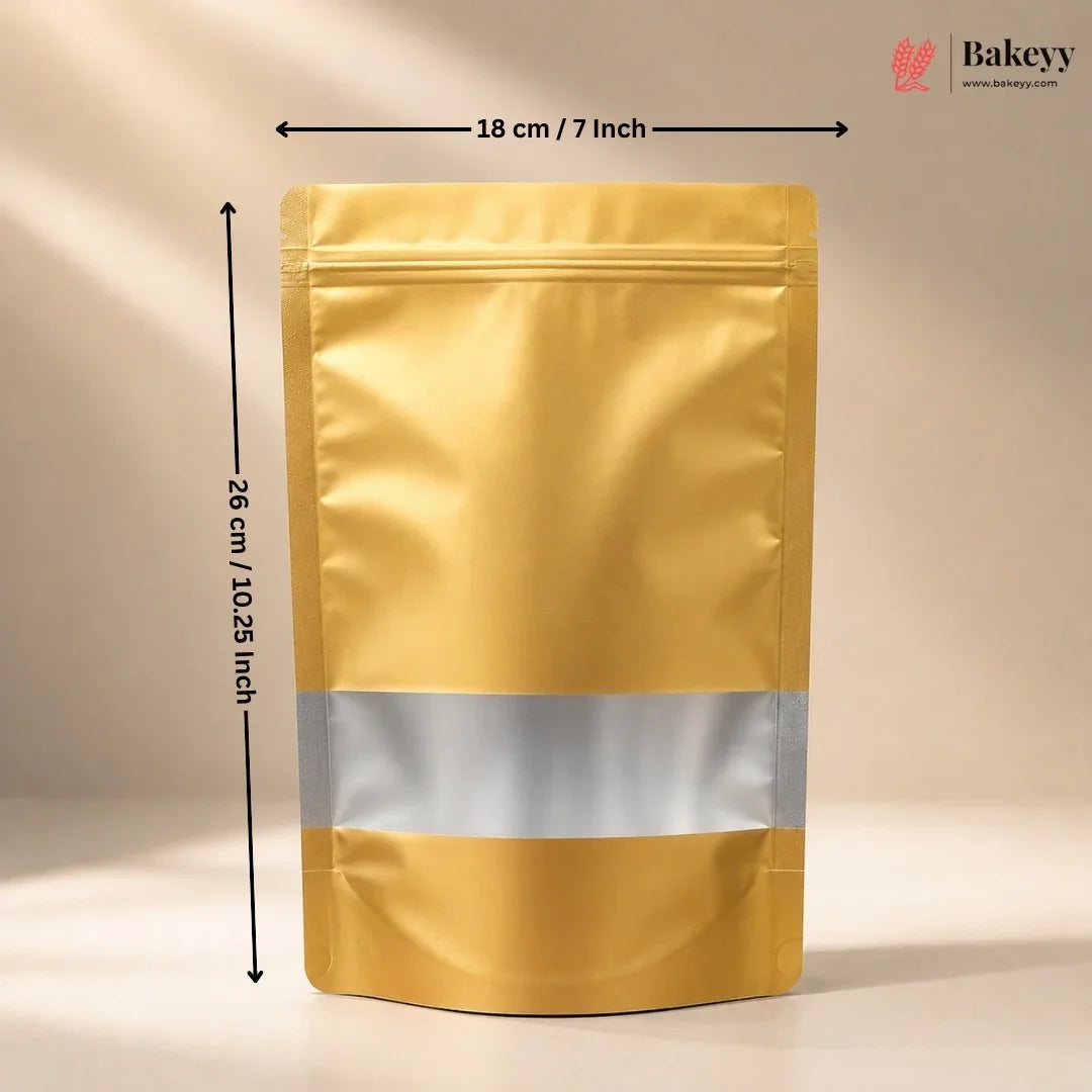 A metallic gold stand-up pouch bag with a reflective silver band around the middle, shown with black dimension arrows indicating 18 cm (7 inches) wide and 28 cm (10.25 inches) tall.