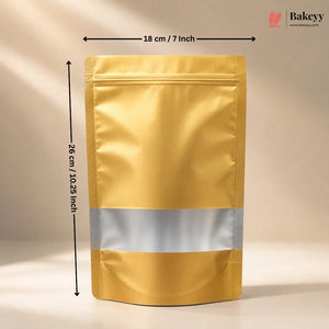 A metallic gold stand-up pouch bag with a reflective silver band around the middle, shown with black dimension arrows indicating 18 cm (7 inches) wide and 28 cm (10.25 inches) tall.