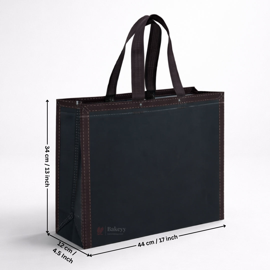Black tote bag with measurements on a white background