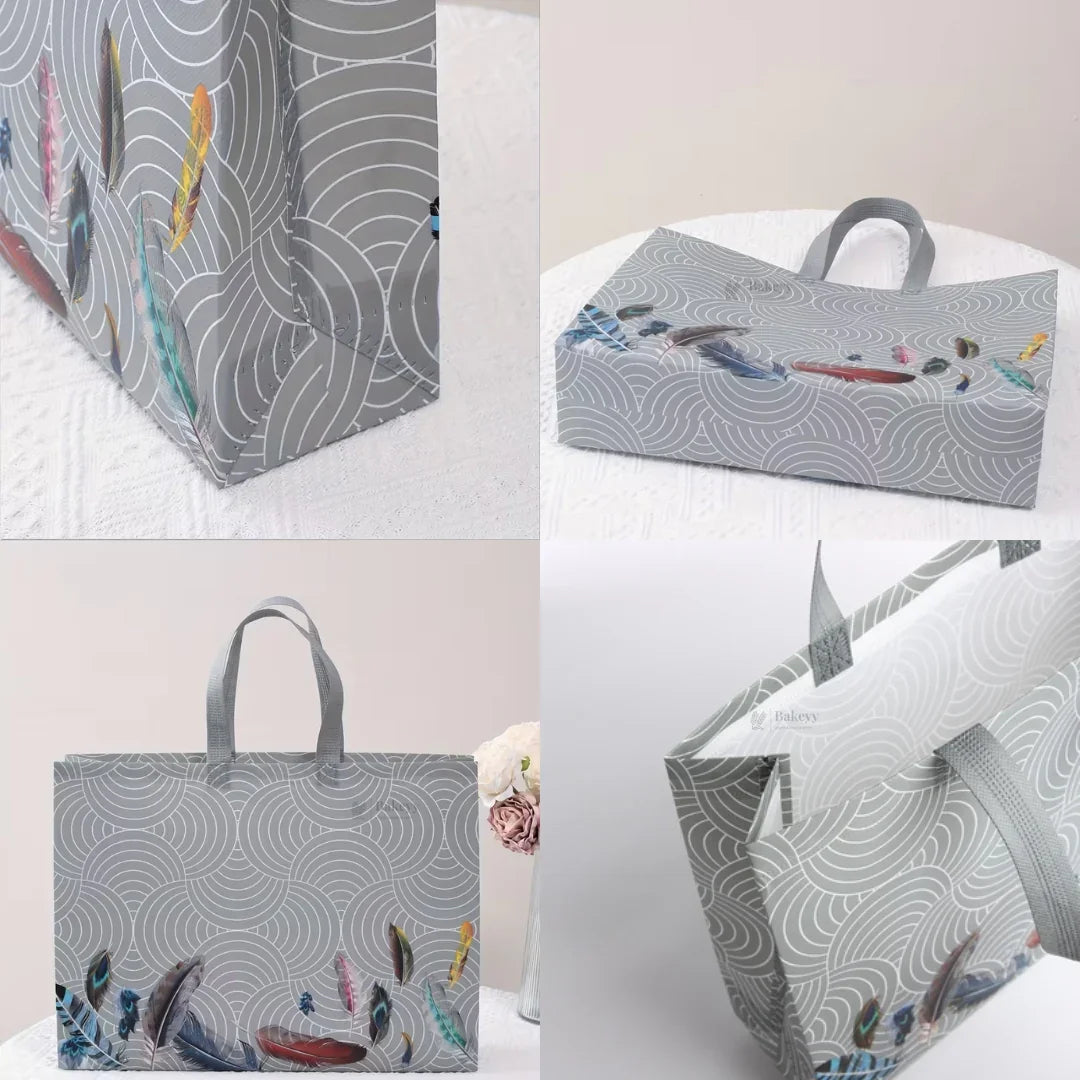 GreyPatternedLaminatedCarryBagwithFeatherArtwork_3 - Bakeyy.com