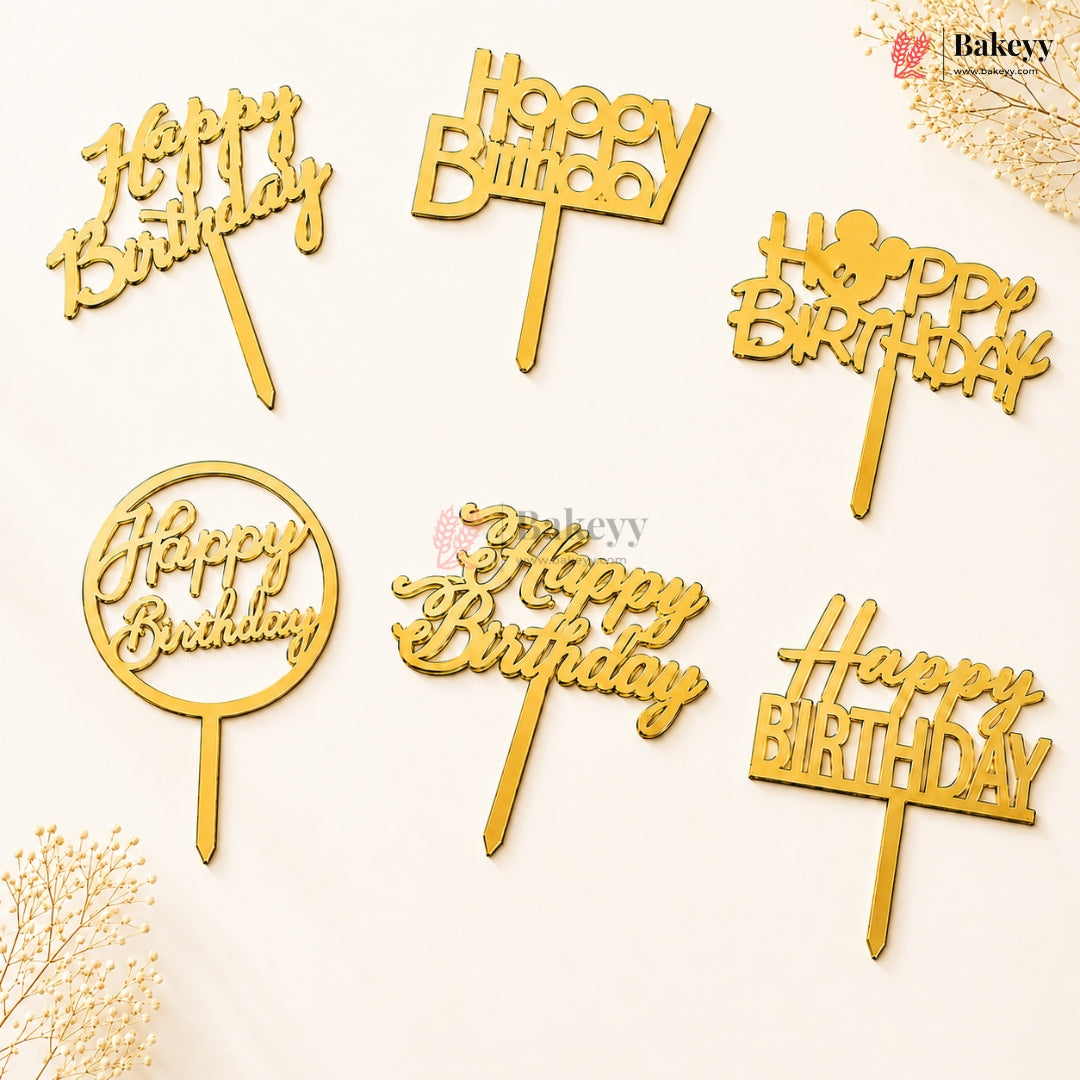 Set of gold 'Happy Birthday' cake toppers on a light background with 'Bakeyy' branding.