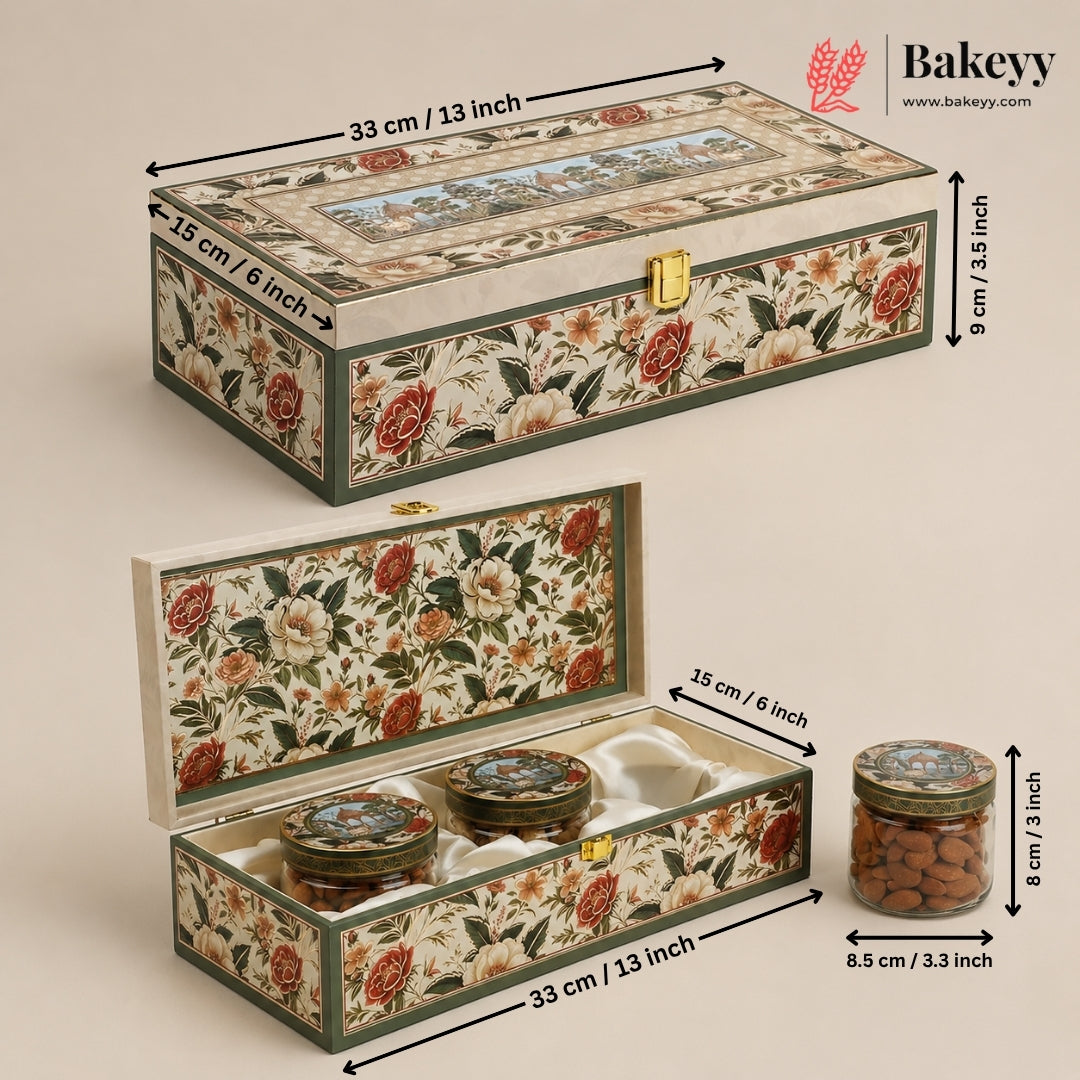 A decorative rectangular storage box with a floral print exterior and interior, shown closed and open with dimension labels. The box has a cream base with red, orange, and green floral pattern, a gold-tone clasp, and a small window on top.