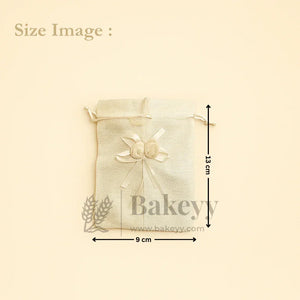 Jute potli gift bag with floral accents, 9x13 cm, ideal for bakery packaging from Bakeyy