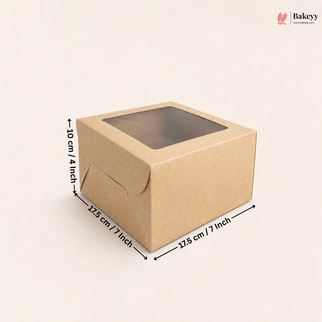 A square brown kraft paper bakery box with a clear window on top, shown with dimension arrows and labels indicating 17.5 cm by 17.