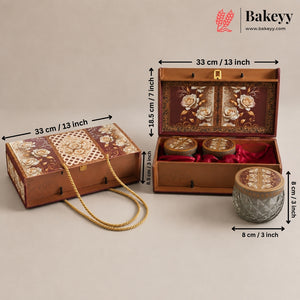 Decorative wooden gift box set with floral inlay, shown closed and open with dimension arrows and measurements on a beige background. The Bakeyy brand logo appears in the top right.