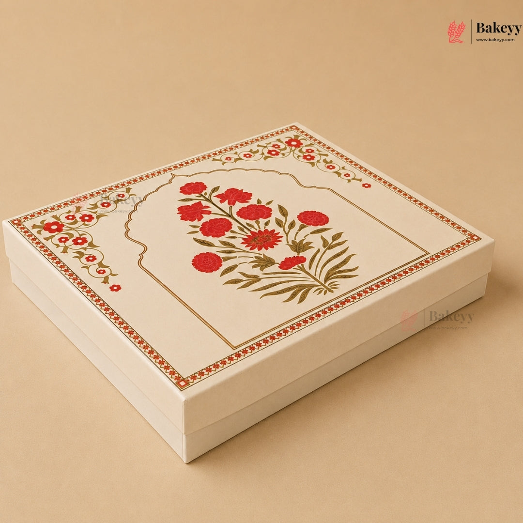 A square cream-colored gift box with a decorative lid featuring a red floral arch motif and gold border details, set against a solid beige background.