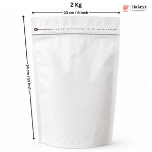 A white stand-up resealable pouch with a zipper and a small round vent hole, shown with dimension arrows indicating 23 cm width and 34 cm height, plus text reading 2 Kg and a Bakeey logo.
