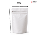 A white stand-up pouch package shown on a light gray background with measurement arrows and text indicating 500 g, 15 cm / 6 inch width, and 23 cm / 9 inch height. A Bakeey logo appears in the top right.