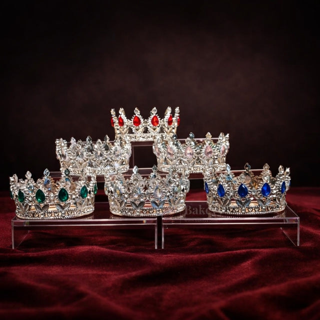 Elegant royal crown design with crystal stones
Premium sliver finish with detailed carving
Lightweight and easy to place on cakes
Reusable decorative topper
Perfect for birthday cakes, themed cakes, baby shoots, and table décor
Available in multiple stone color variants
