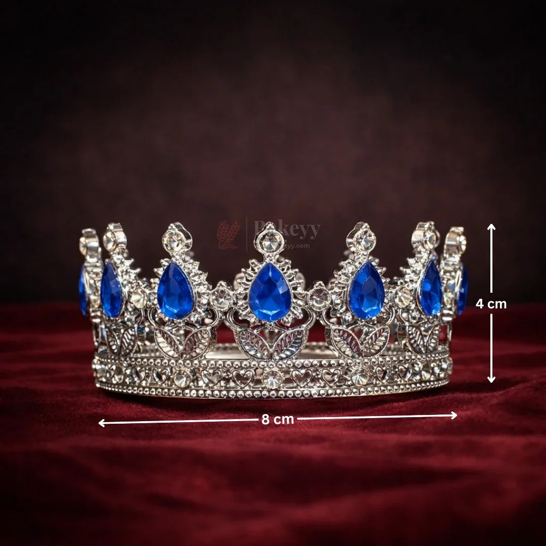 Elegant royal crown design with crystal stones
Premium sliver finish with detailed carving
Lightweight and easy to place on cakes
Reusable decorative topper
Perfect for birthday cakes, themed cakes, baby shoots, and table décor
Available in multiple stone color variants