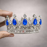 Elegant royal crown design with crystal stones
Premium sliver finish with detailed carving
Lightweight and easy to place on cakes
Reusable decorative topper
Perfect for birthday cakes, themed cakes, baby shoots, and table décor
Available in multiple stone color variants