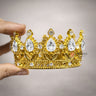 Elegant royal crown design with crystal stones
Premium gold finish with detailed carving
Lightweight and easy to place on cakes
Reusable decorative topper
Perfect for birthday cakes, themed cakes, baby shoots, and table décor
Available in multiple stone color variants