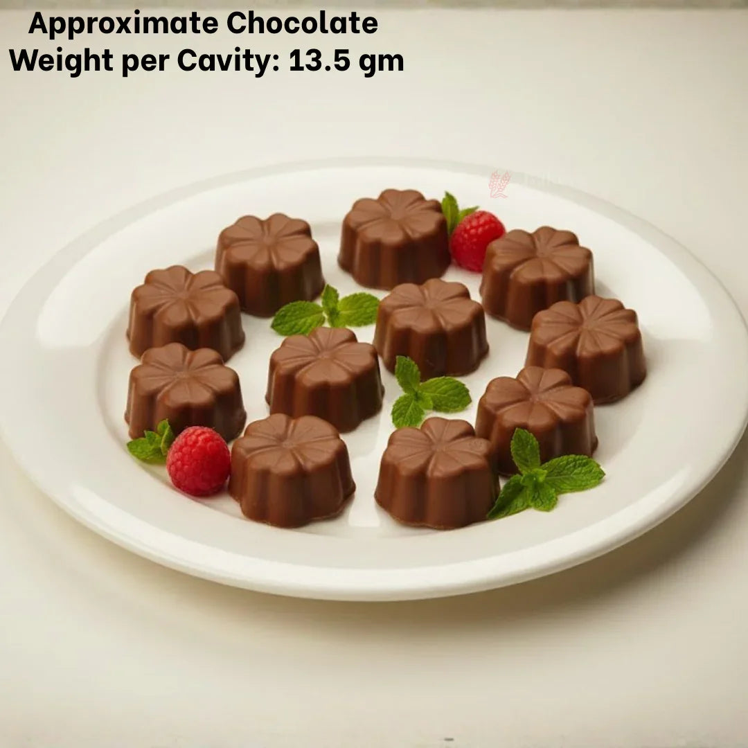 Flower-shaped chocolate bonbons on white plate, garnished with mint and raspberry, Bakeyy baking supplies