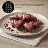 Plastic hollow heart chocolate mould tray with heart-shaped chocolates on a decorative plate, Bakeyy baking supplies