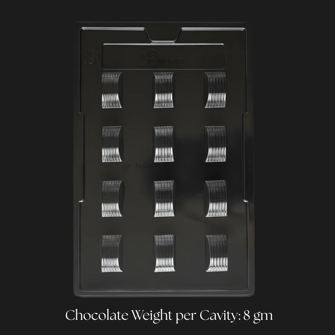 Mould_002_Curved_Chocolate_Mould_with_Ribbed_Texture_12_Cavity_Professional_Chocolate_Making_Mould_Pack_of_1 - Bakeyy.com