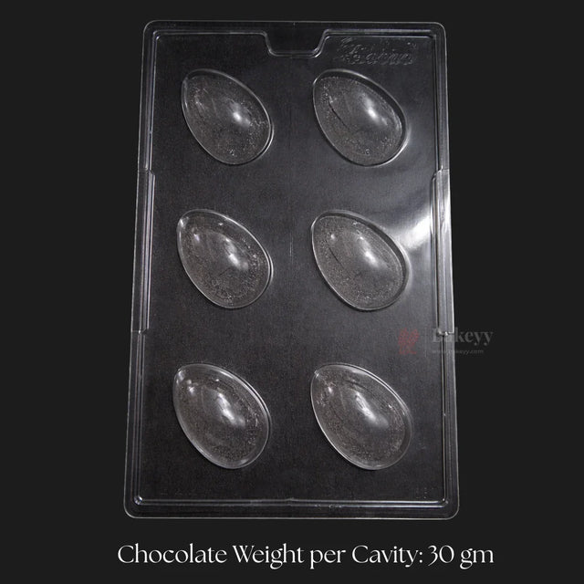 Clear plastic mould tray with 6 smooth Easter egg cavities, chocolate mould from Bakeyy