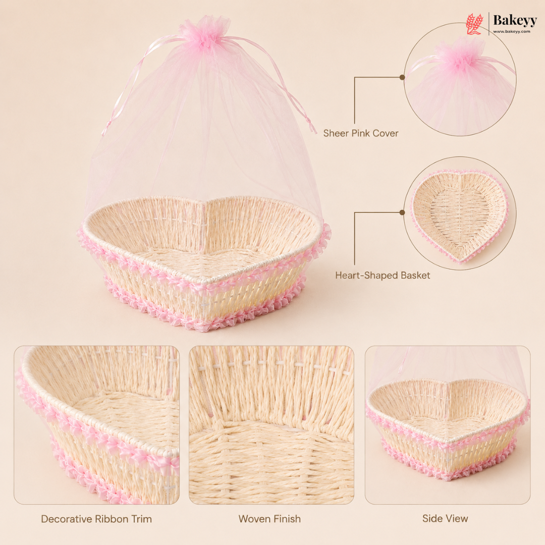 Heart-shaped basket with sheer pink cover and decorative ribbon trim, featuring Bakey brand.