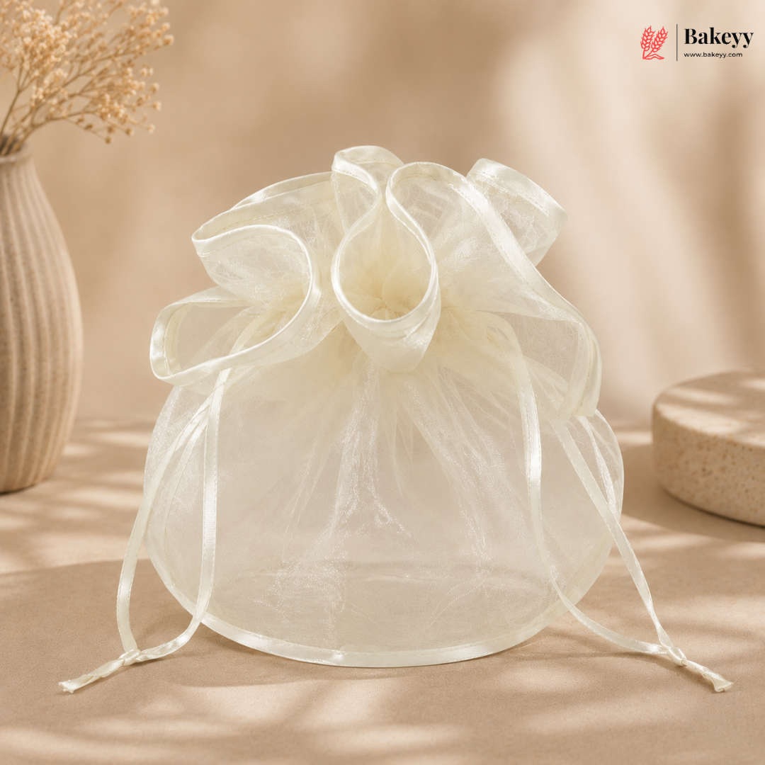 Translucent drawstring bag on a beige background with 'Bakeyy' branding.