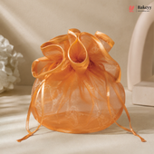 Orange organza bag on a light background with 'Bakeyy' branding.