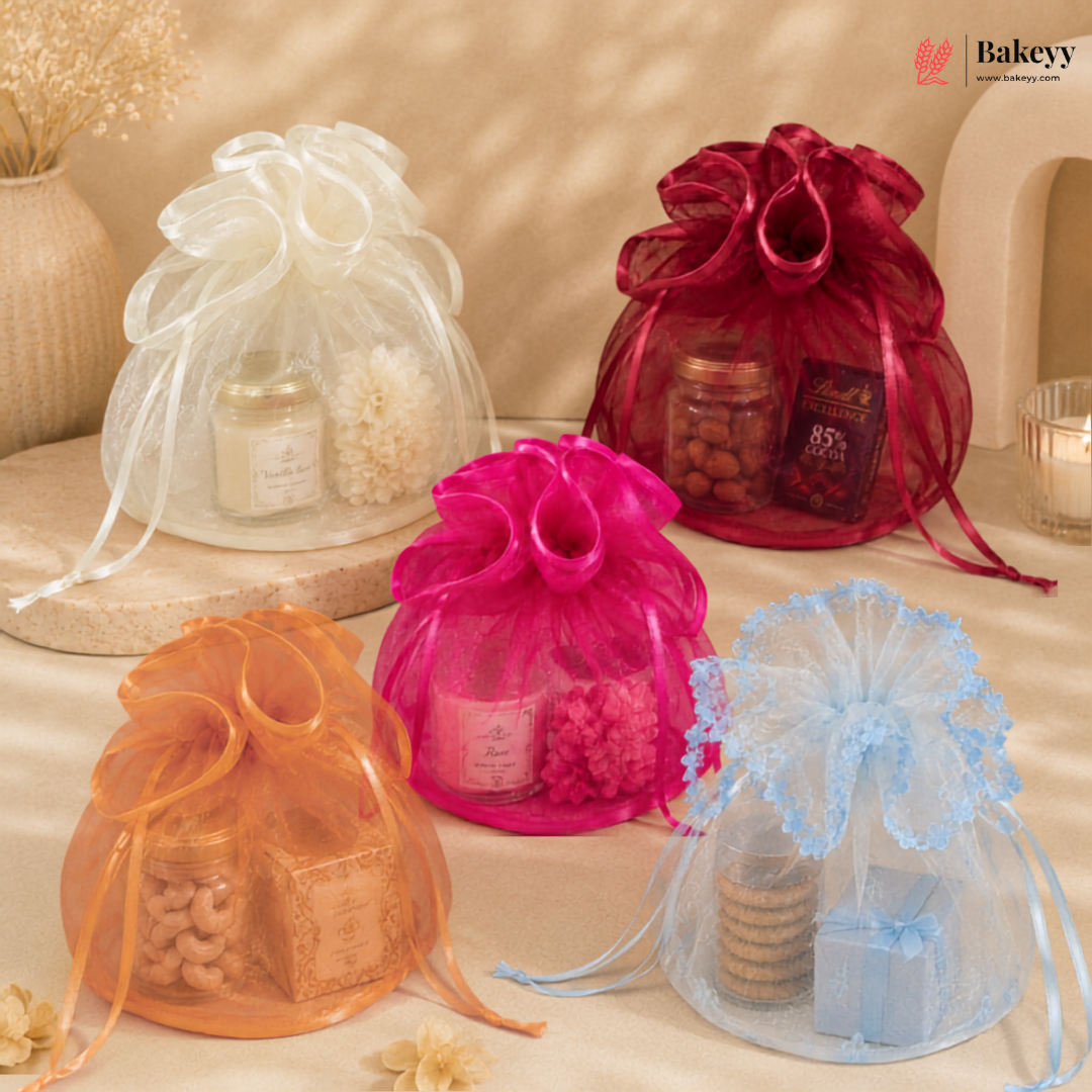 Colorful drawstring bags with baked goods on a neutral background, featuring the Bakeyy brand.