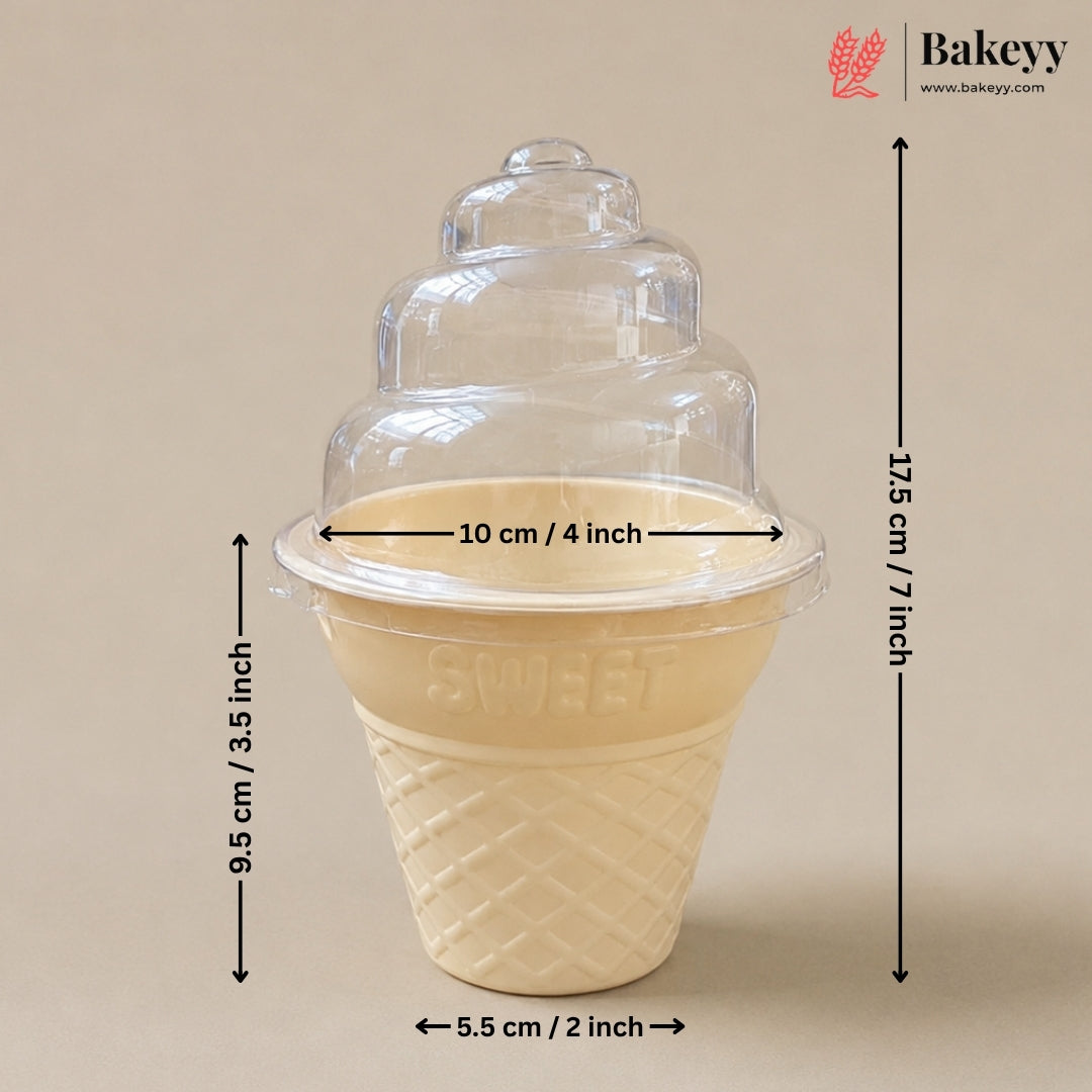 A clear plastic ice cream cone lid with a beige waffle-cone-shaped base, shown on a beige background with black dimension arrows and text indicating measurements of 17.5 cm total height, 9.