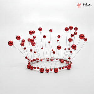 Red beaded tiara on a white background with 'Bakeyy' branding.