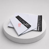 White mailing bag with black strip and red logo on a white platform