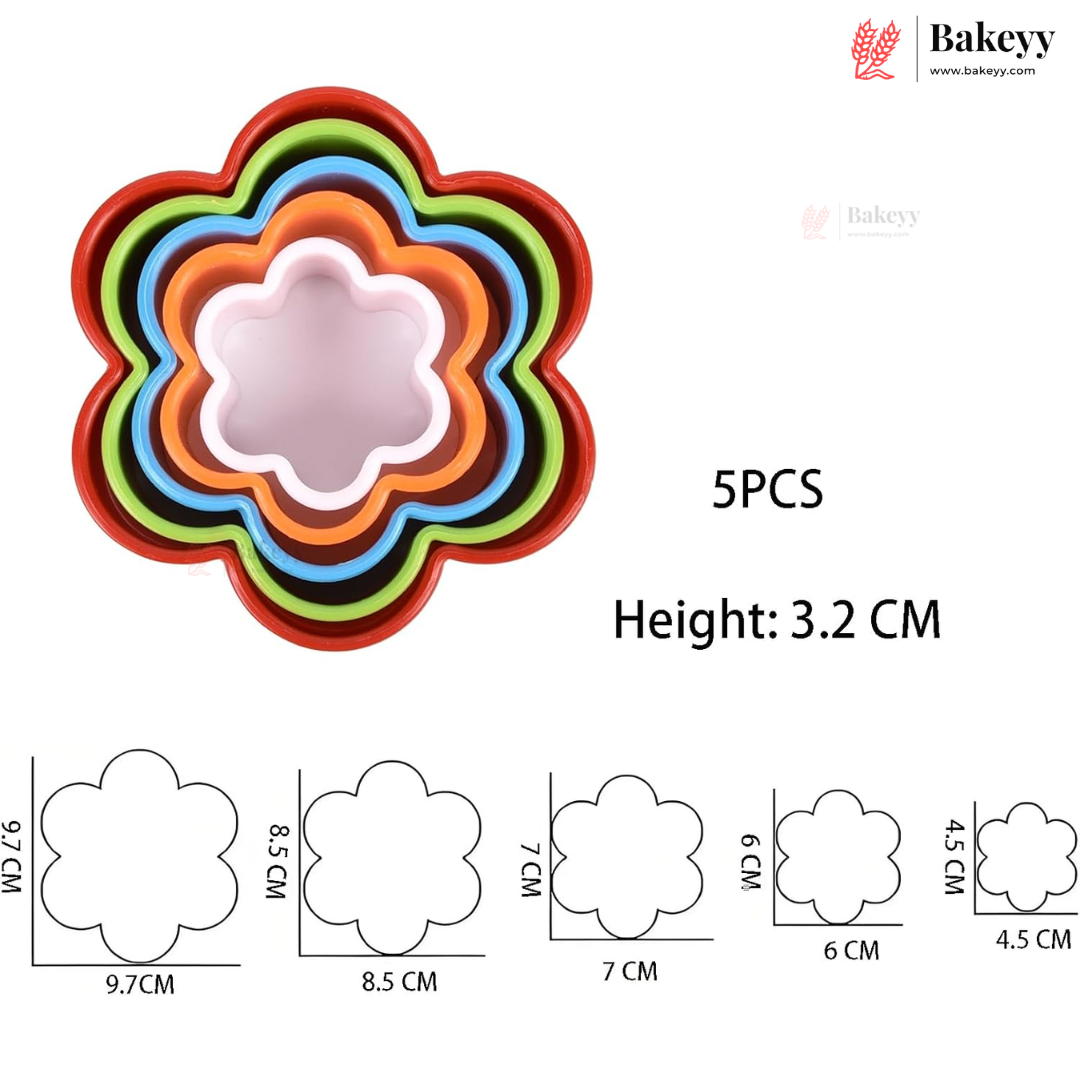 A set of five nested flower-shaped cookie cutters in red, orange, green, blue, and black, with a pink inner tray shown. Text on the image reads '5PCS' and 'Height: 3.