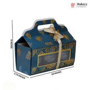 Blue gift box with gold leaf pattern and handle, featuring dimensions and Bakeyy branding.
