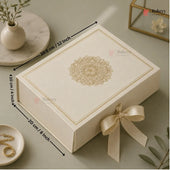 An off-white rectangular gift box with a gold mandala design on top and a cream ribbon bow, shown with dimension arrows indicating 30.5 cm by 40 cm by 20 cm.