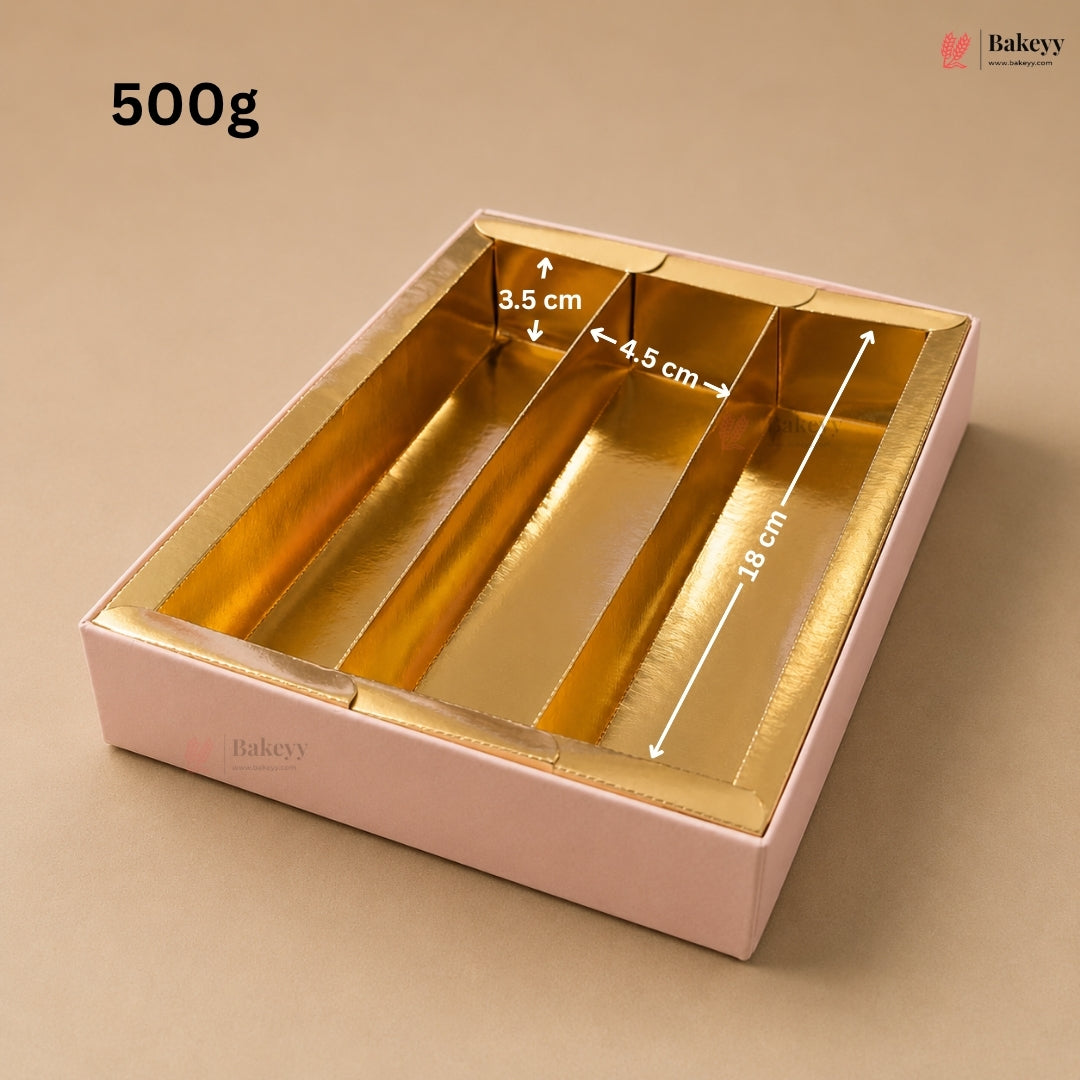 A pink bakery box with metallic gold interior compartments, shown on a beige background with printed dimensions (3.5 cm, 4.