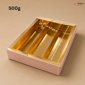 A pink bakery box with metallic gold interior compartments, shown on a beige background with printed dimensions (3.5 cm, 4.