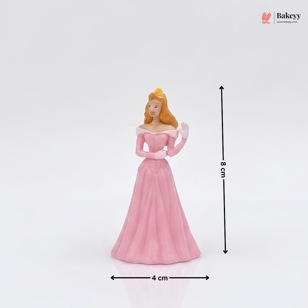 Princess figurine in a pink dress with measurements on a white background, featuring the Bakey brand.